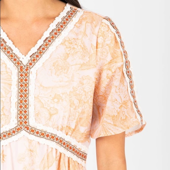 The Kenley detail empire waist in peach. - Picture 4 of 5